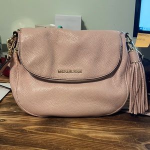 Michael Kors Bedford Medium pink tassel leather crossbody.